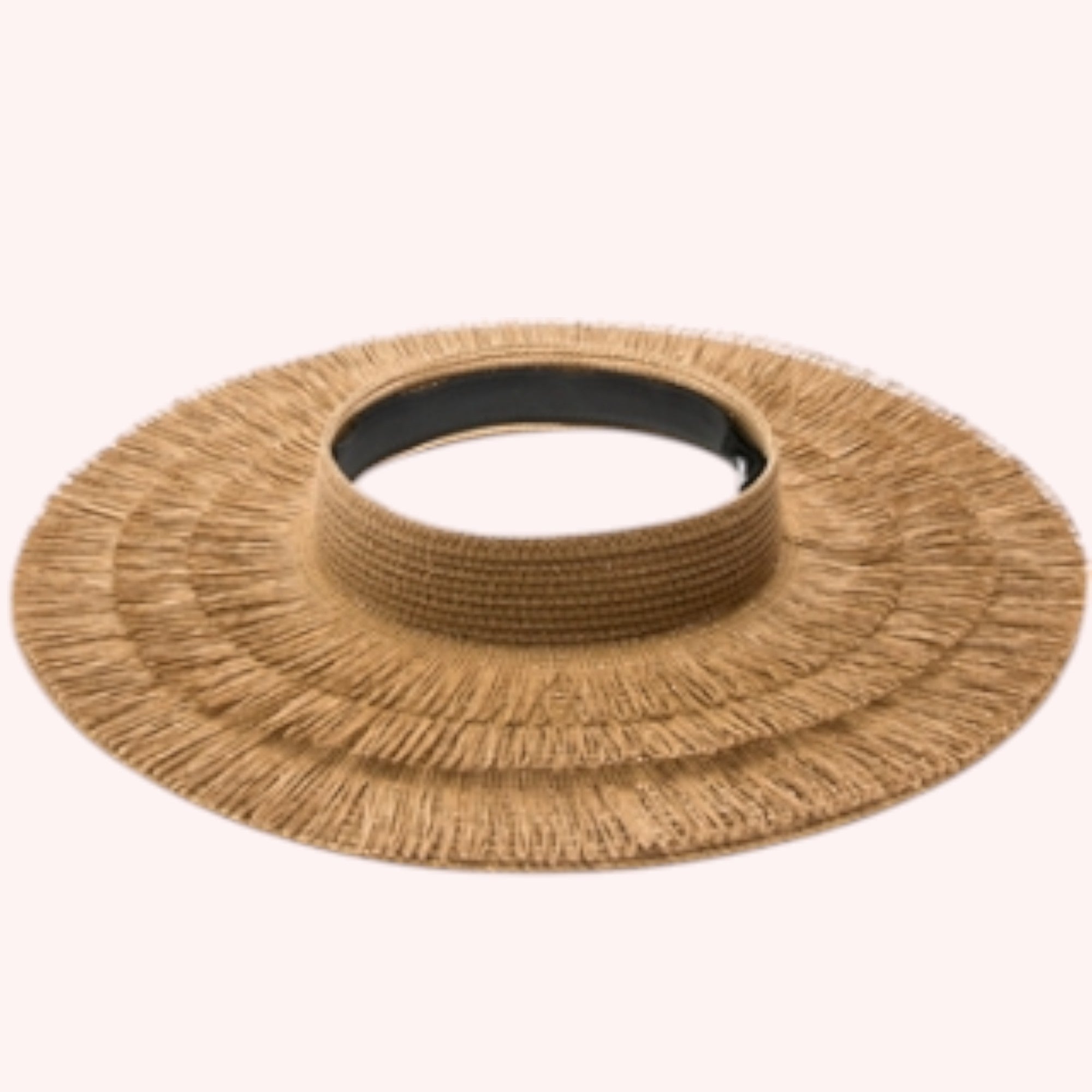 Straw lampshade sun hat with pinned-up back brim. Tropical print sheer sash tied through the eyelets. UPF 50+ Adjustable inner drawstring Brim: 4 in.