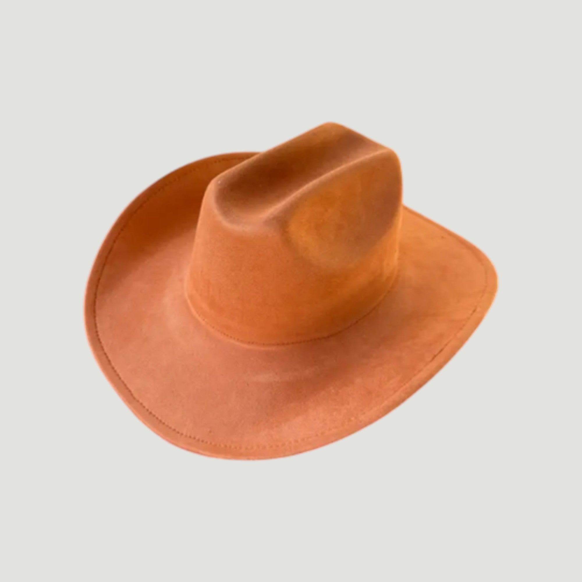 Structured vegan Suede cattleman cowboy hat with shapeable brim. Perfect for western, boho, and festival looks. Adjustable fit