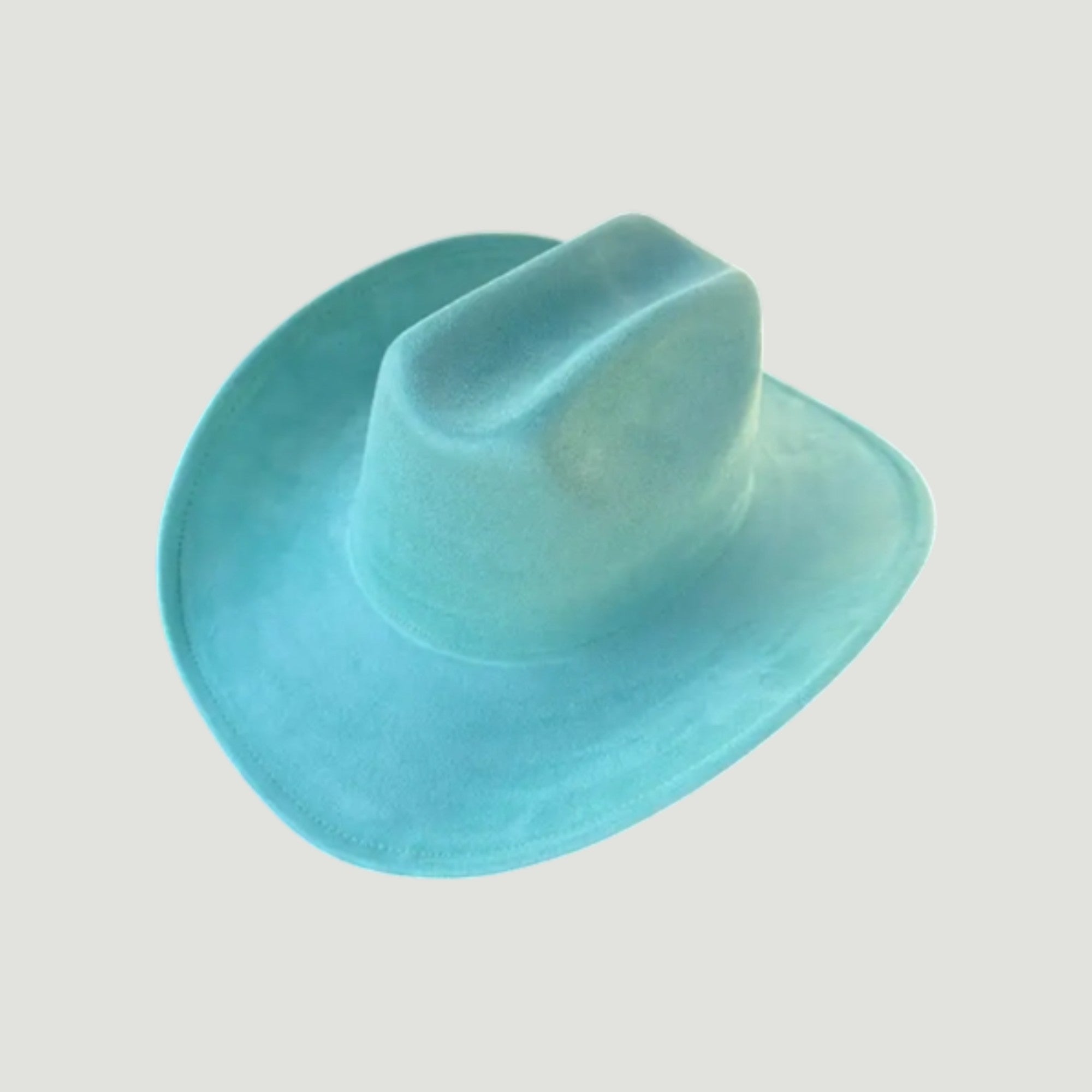 Structured vegan Suede cattleman cowboy hat with shapeable brim. Perfect for western, boho, and festival looks. Adjustable fit