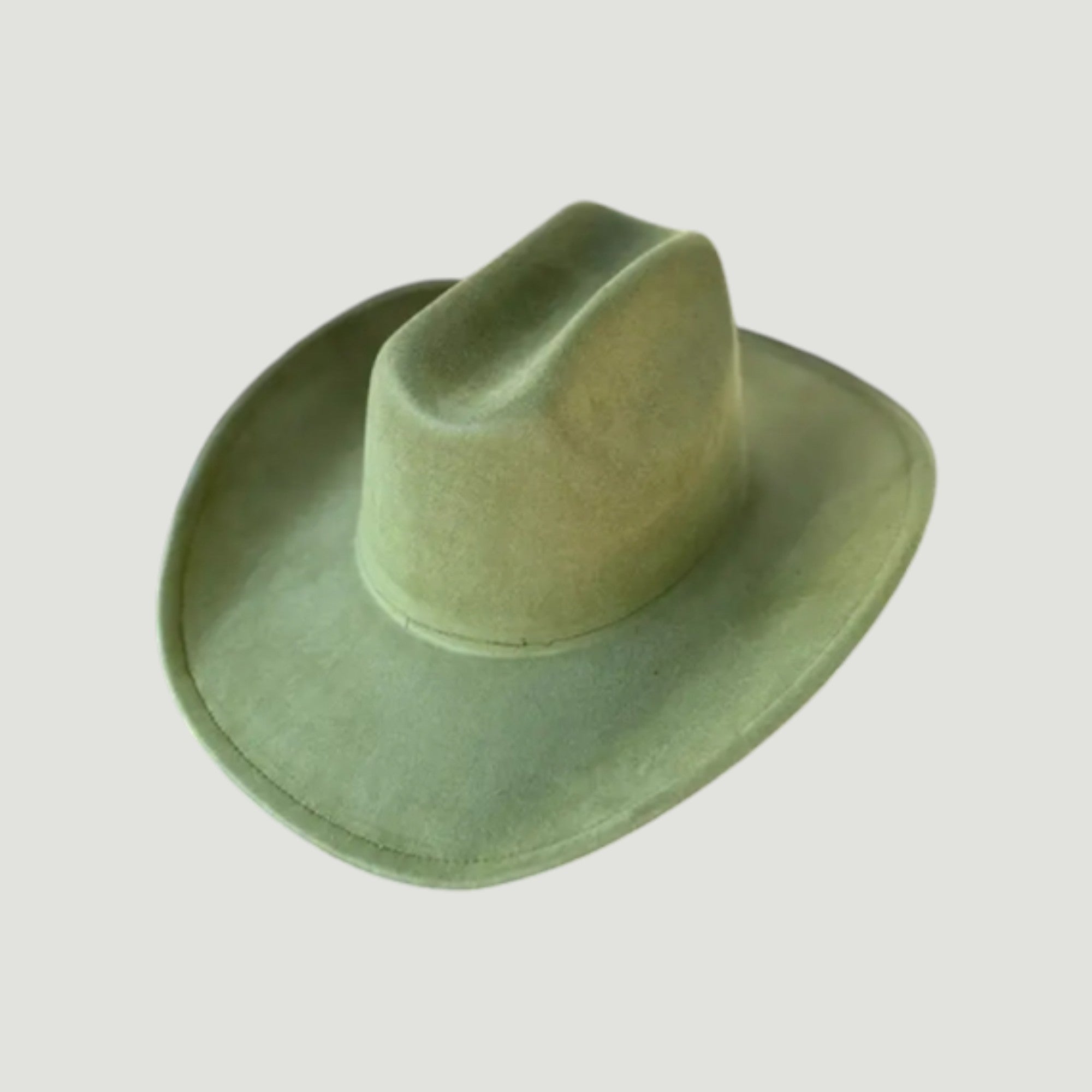 Structured vegan Suede cattleman cowboy hat with shapeable brim. Perfect for western, boho, and festival looks. Adjustable fit