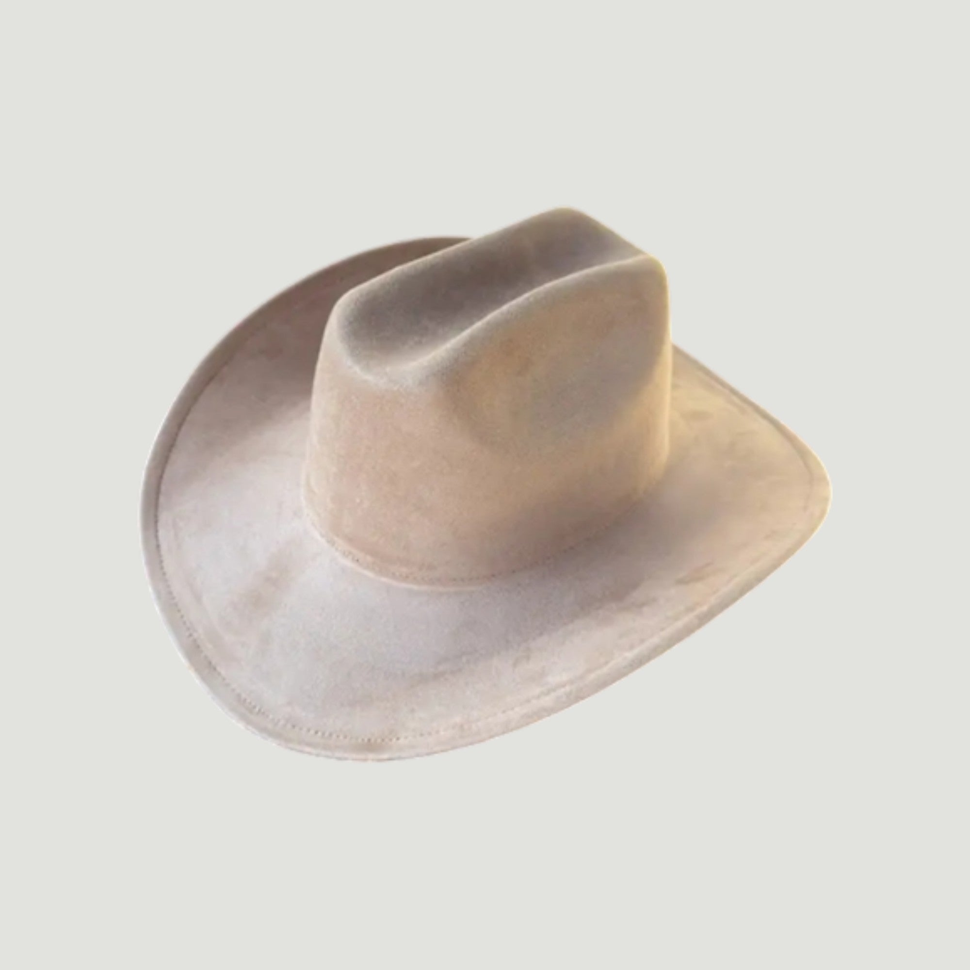Structured vegan Suede cattleman cowboy hat with shapeable brim. Perfect for western, boho, and festival looks. Adjustable fit
