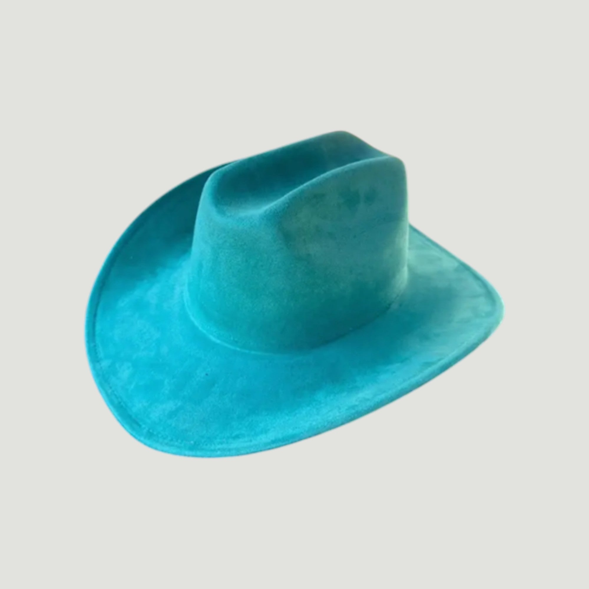Structured vegan Suede cattleman cowboy hat with shapeable brim. Perfect for western, boho, and festival looks. Adjustable fit