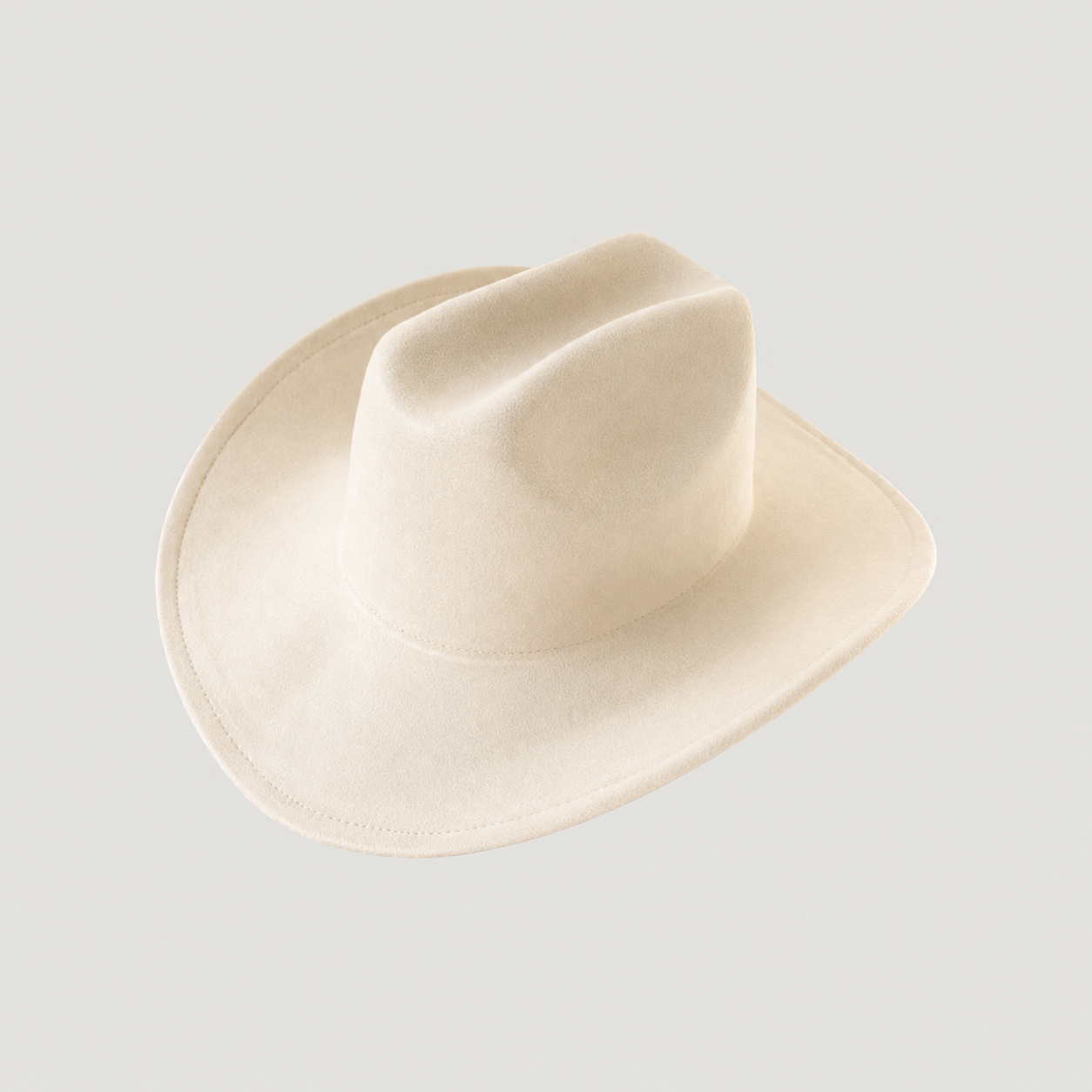 Structured vegan Suede cattleman cowboy hat with shapeable brim. Perfect for western, boho, and festival looks. Adjustable fit