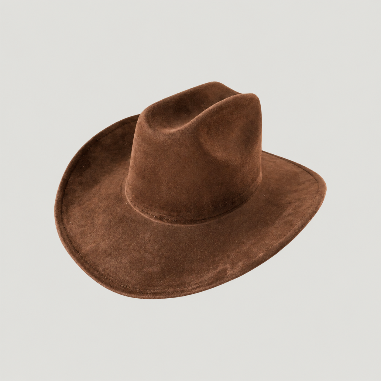 Structured vegan Suede cattleman cowboy hat with shapeable brim. Perfect for western, boho, and festival looks. Adjustable fit
