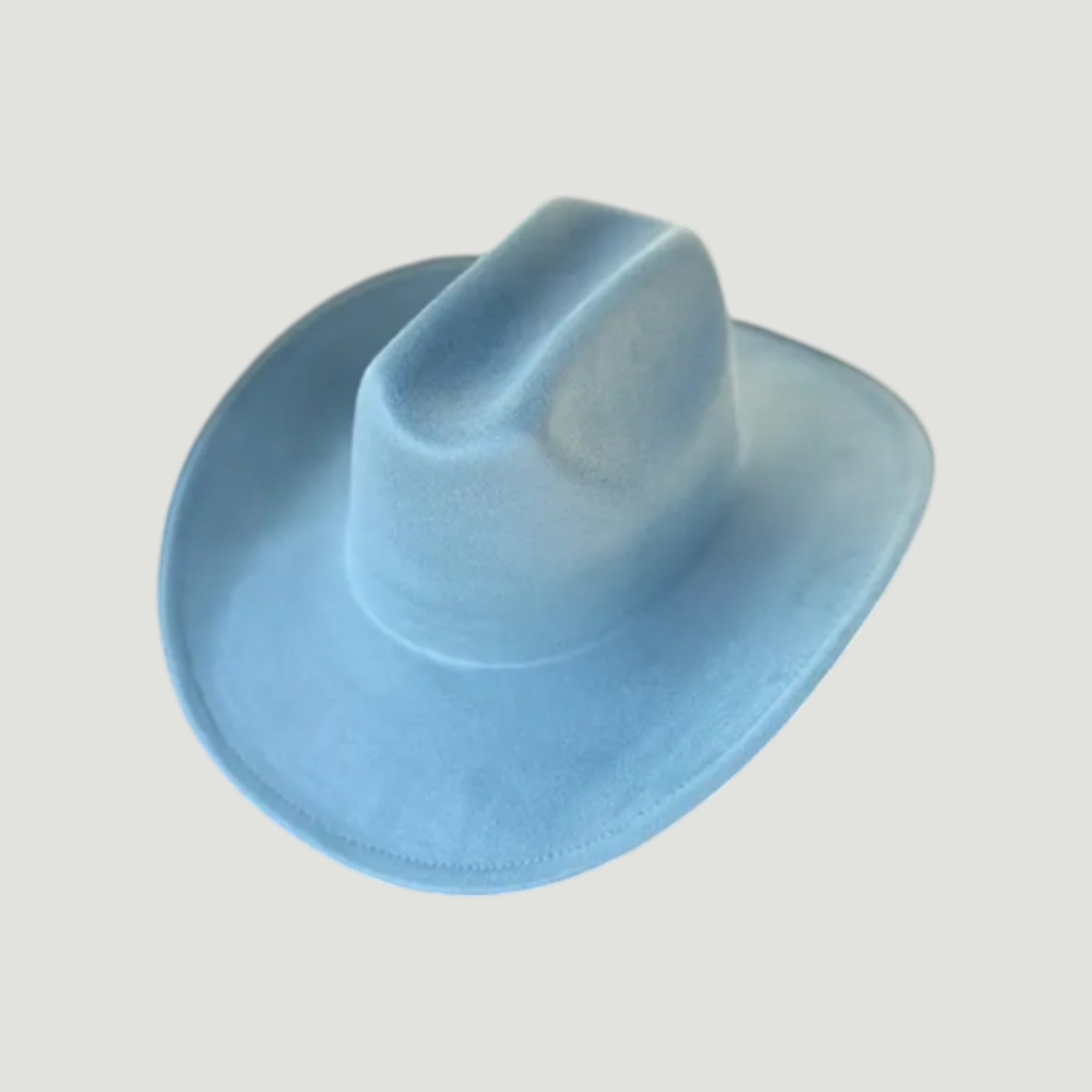 Structured vegan Suede cattleman cowboy hat with shapeable brim. Perfect for western, boho, and festival looks. Adjustable fit