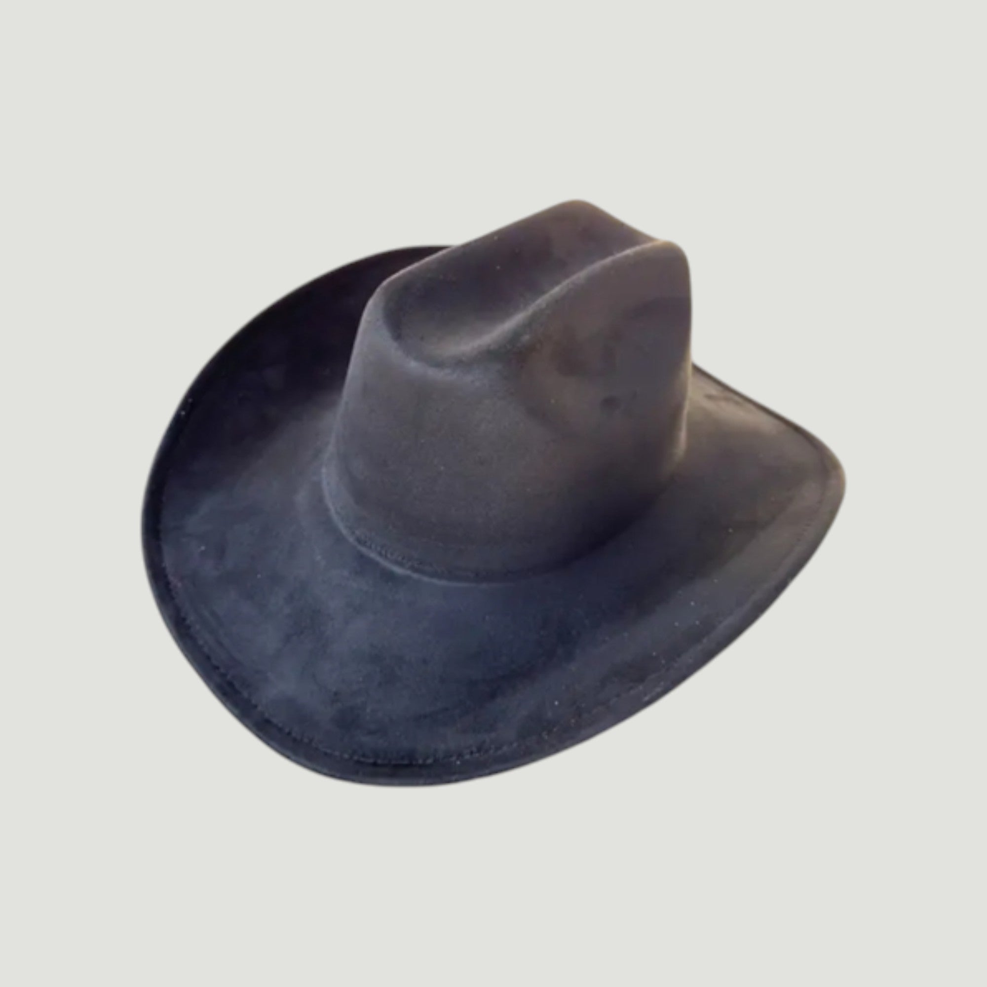 Structured vegan Suede cattleman cowboy hat with shapeable brim. Perfect for western, boho, and festival looks. Adjustable fit
