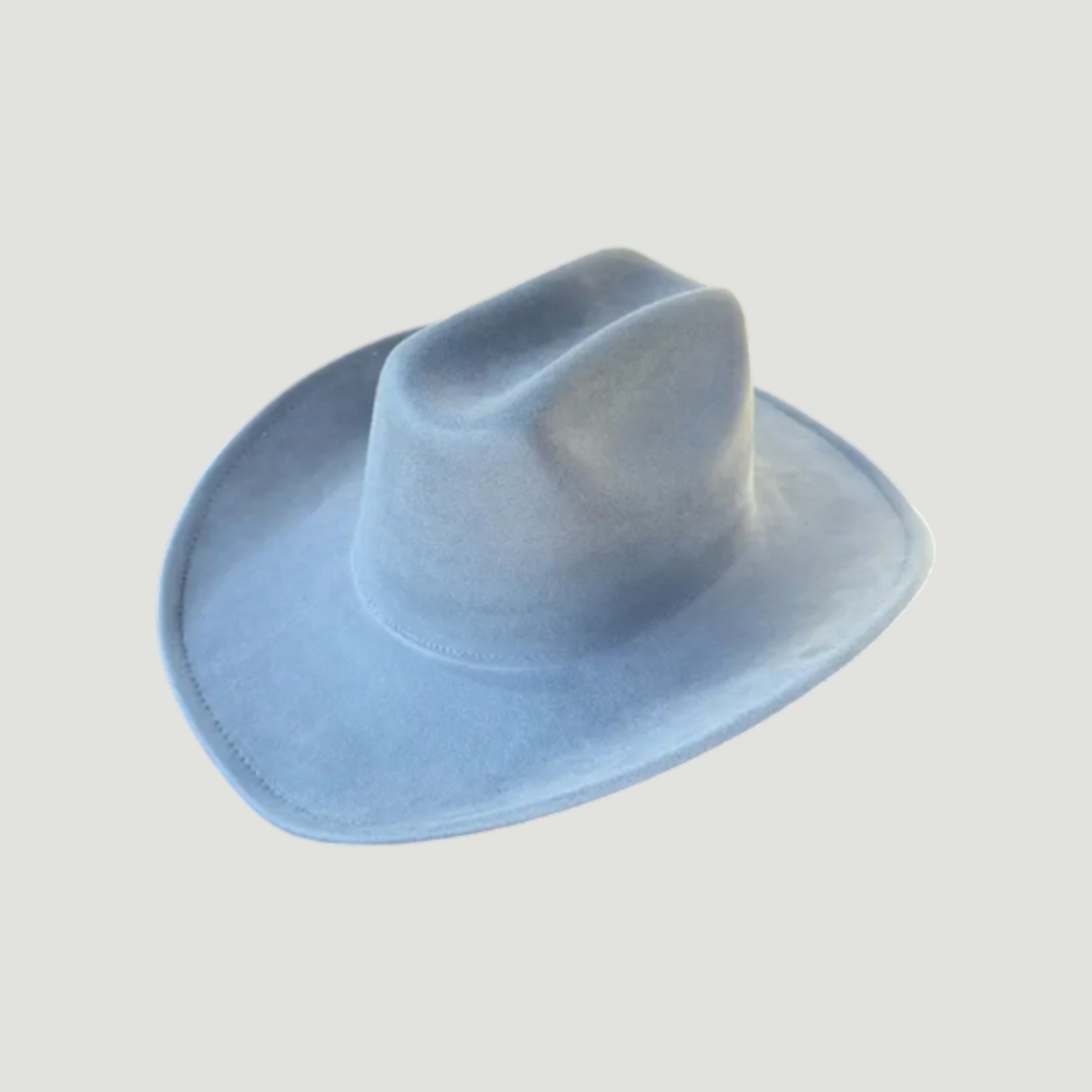 Structured vegan Suede cattleman cowboy hat with shapeable brim. Perfect for western, boho, and festival looks. Adjustable fit
