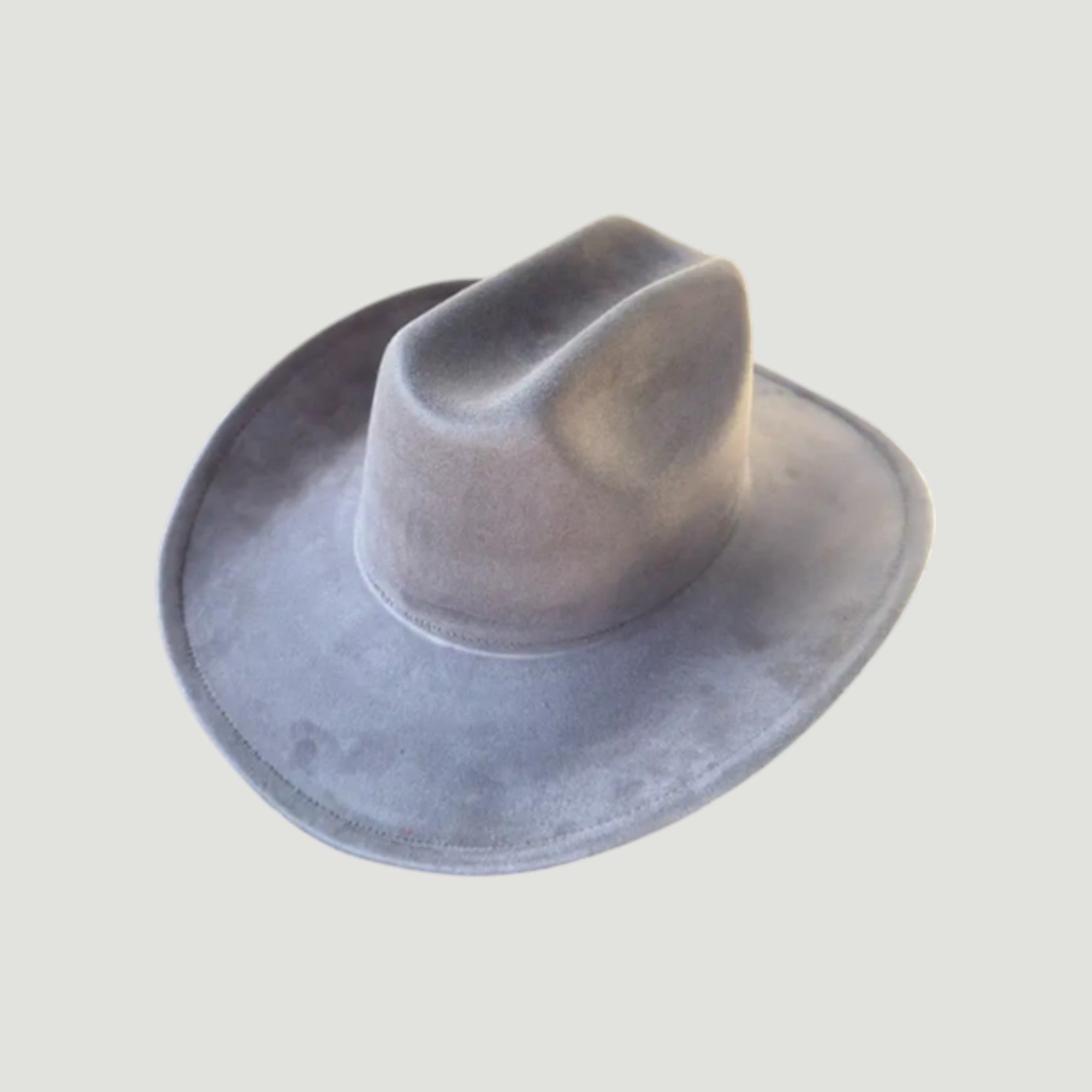 Structured vegan Suede cattleman cowboy hat with shapeable brim. Perfect for western, boho, and festival looks. Adjustable fit
