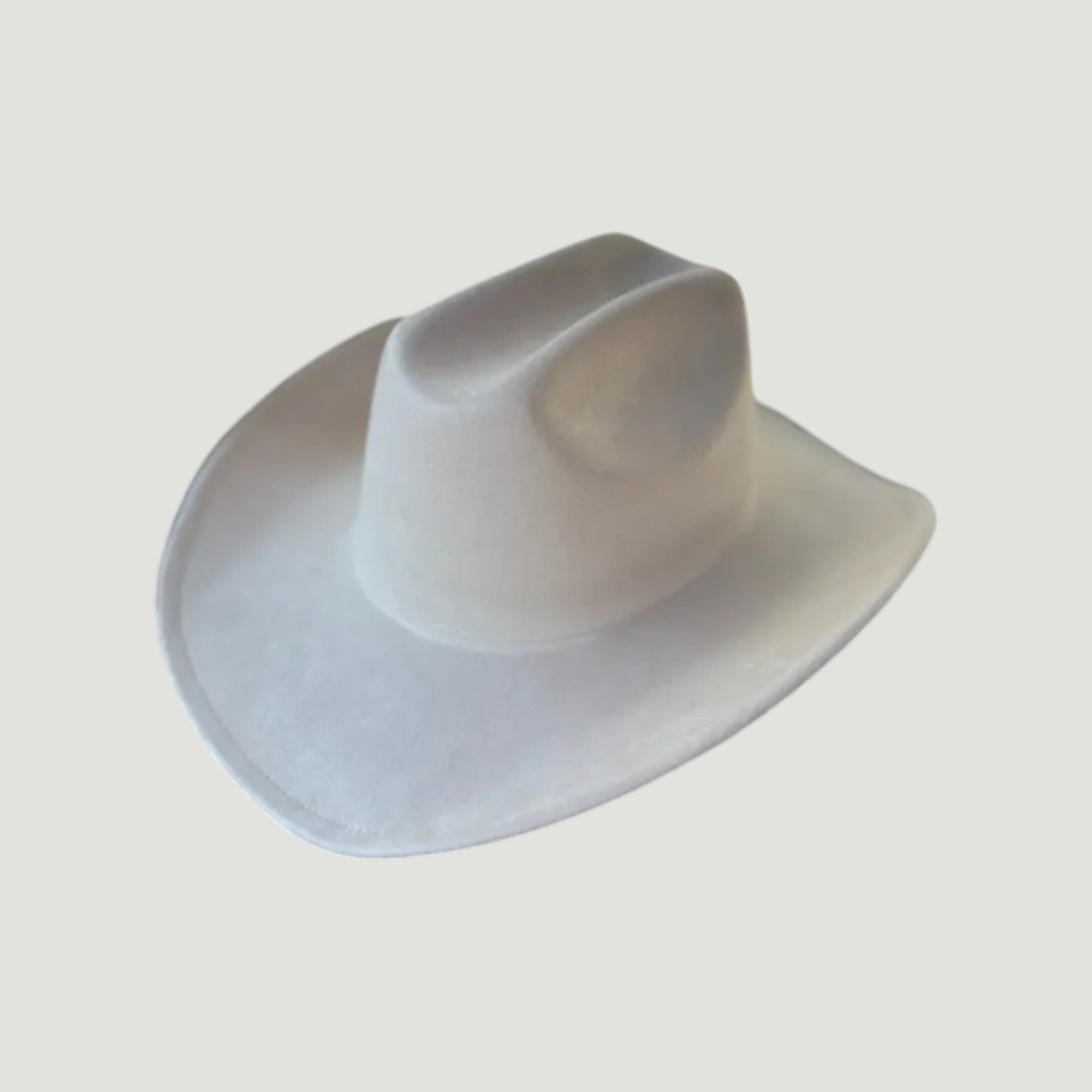 Structured vegan Suede cattleman cowboy hat with shapeable brim. Perfect for western, boho, and festival looks. Adjustable fit