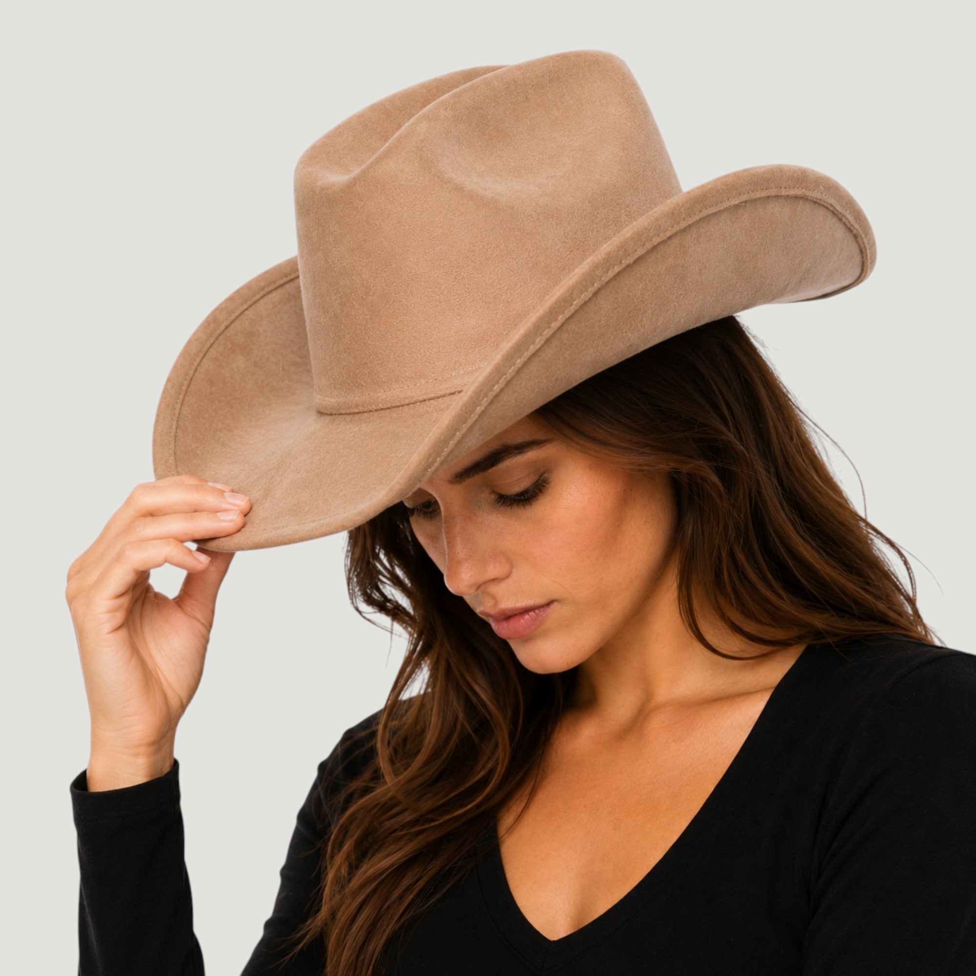Structured vegan Suede cattleman cowboy hat with shapeable brim. Perfect for western, boho, and festival looks. Adjustable fit