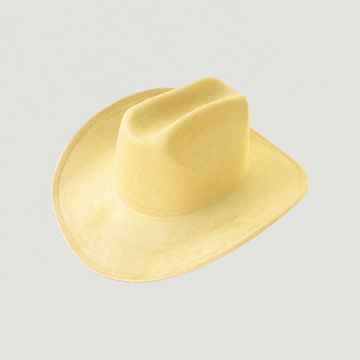 Structured vegan Suede cattleman cowboy hat with shapeable brim. Perfect for western, boho, and festival looks. Adjustable fit